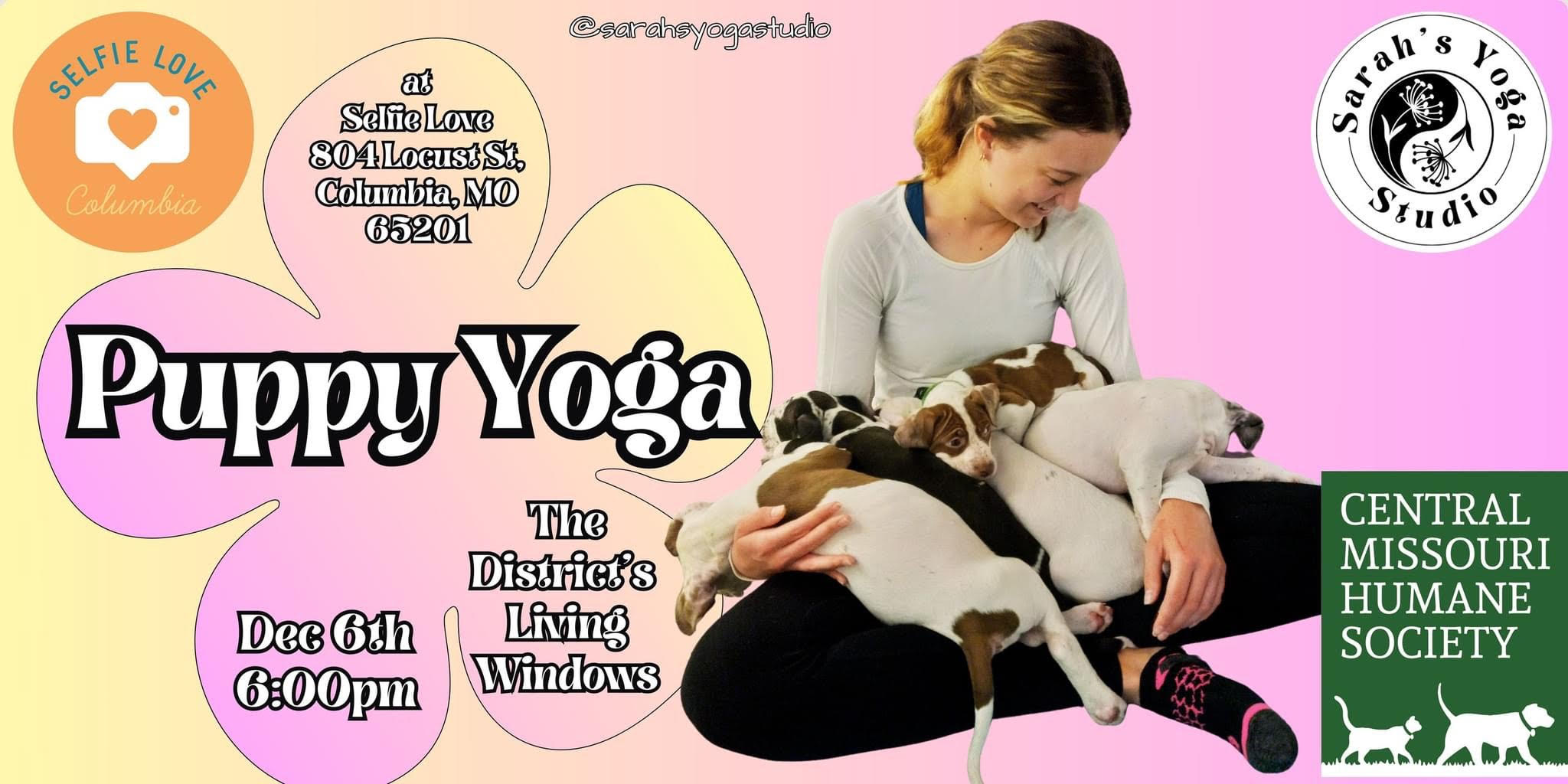 woman holding puppies while doing yoga